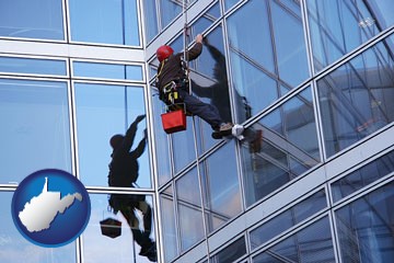 a window washer, washing office building windows - with West Virginia icon