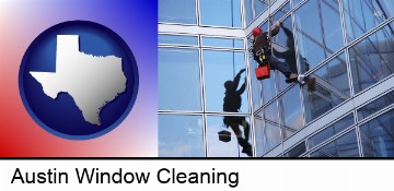 a window washer, washing office building windows in Austin, TX