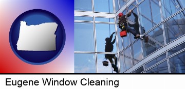 a window washer, washing office building windows in Eugene, OR