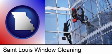 a window washer, washing office building windows in Saint Louis, MO